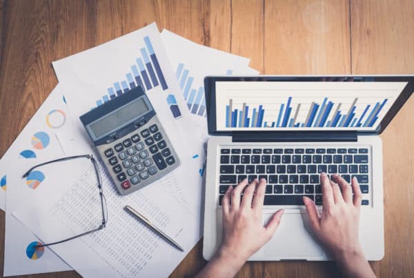 hands working on a computer